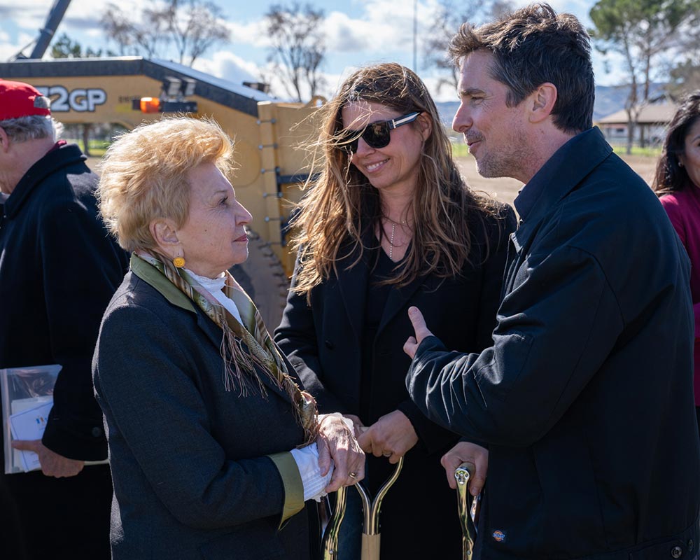 Veronika Reinelt, President of AACW greets Sibi and Christian Bale at Together California’s Groundbreaking Ceremony